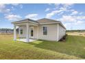 Home with a covered patio that provides the perfect spot for outdoor relaxation at 457 Acosta Circle, Conway, SC 29527
