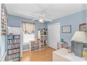 Comfortable bedroom featuring a ceiling fan and a window with a checkered valance at 6001-1086 S Kings Hwy., Myrtle Beach, SC 29575