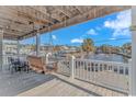 Inviting deck with a swing and view of the waterfront at 6001-1086 S Kings Hwy., Myrtle Beach, SC 29575