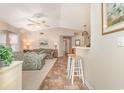 Inviting living room with vaulted ceiling, ceiling fan, and neutral decor at 8538 Hopkins Circle # E, Surfside Beach, SC 29575