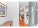 Inviting foyer with hardwood floors and a view into the living area, creating an open feel at 914 Hillside Dr. S # O, North Myrtle Beach, SC 29582