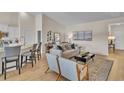 Beautiful living space with an open floor plan and designer touches, including chic seating at 1609 Seachase Way, North Myrtle Beach, SC 29582