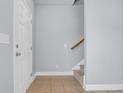 Foyer features tiled floors and a white door with brushed nickel hardware at 228 Gresham Ln., Myrtle Beach, SC 29588