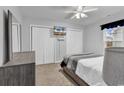 Cozy bedroom featuring carpet, closet and a mounted television at 7228 Guinevere Circle, Myrtle Beach, SC 29588