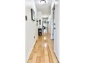 Hallway with beautiful wood flooring and decorative touches at 210 Double Eagle Dr. # G1, Myrtle Beach, SC 29575