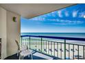 Balcony view offering ocean views, complete with seating for relaxing and enjoying the scenery at 2500 N Ocean Blvd. # 705, North Myrtle Beach, SC 29582