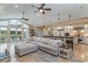 Spacious living room with a large sectional sofa, open to the kitchen area at 3100 Lahinch Dr., Myrtle Beach, SC 29579