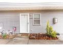 A cozy front entrance with small garden at 4584 Lomax Ct. # 1B, Murrells Inlet, SC 29576