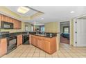 Charming kitchen featuring granite countertops, stainless steel appliances, and an open view to the bedroom at 504 N Ocean Blvd. # 310, Myrtle Beach, SC 29577