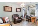 Cozy sitting area with a leather recliner, desk and telescope, offering a comfortable space to relax at 808 Kingfisher Dr., Myrtle Beach, SC 29577