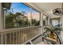 Covered patio with a fan, furniture, and views of the neighborhood at 1058 Sea Mountain Hwy. # 14-302, North Myrtle Beach, SC 29582
