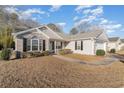 Well-kept single story home with brick and vinyl siding, complemented by neat landscaping at 1412 Gailard Dr., Conway, SC 29526