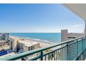 Serene balcony view overlooking the beautiful ocean and sandy beach, perfect for relaxation and enjoying the scenery at 205 74Th Ave. N # 1508, Myrtle Beach, SC 29572