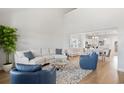 Bright and airy living room featuring hardwood floors, a comfortable sofa, and stylish decor at 2416 Campton Loop, Conway, SC 29527