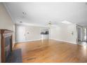 Spacious living room boasting hardwood floors, fireplace, and plenty of natural light at 172 Hawthorn Dr., Pawleys Island, SC 29585