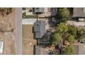 Birds eye view of the house showcasing the roof, driveway, yard, and street at 4048 Sandtrap Ave., Little River, SC 29566