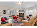 Cozy living room with fireplace, hardwood floors, and sliding doors to patio at 710 Cedar Dr. S, Surfside Beach, SC 29575