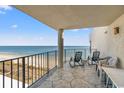 Condo balcony with ocean view and outdoor seating at 1425 S Ocean Blvd. # 8-B, North Myrtle Beach, SC 29582