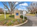 Beautifully landscaped entrance with attractive signage and well-maintained surroundings at 311 Cumberland Terrace Dr. # 7-E, Myrtle Beach, SC 29572