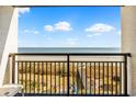 Balcony offering ocean views and a glimpse of the sandy beach at 6804 N Ocean Blvd. # 533, Myrtle Beach, SC 29572