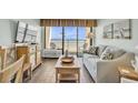 Open living room with comfortable seating and scenic ocean views at 6804 N Ocean Blvd. # 533, Myrtle Beach, SC 29572