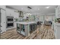 Bright, modern kitchen features a large island, stainless steel appliances, and an open layout perfect for entertaining at 1118 Prescott Circle, Myrtle Beach, SC 29577