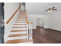 Bright entryway features hardwood floors, a staircase, and an open floor plan at 4350 Goude St., Murrells Inlet, SC 29576