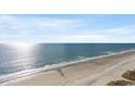 Panoramic aerial view of a pristine beach and ocean shoreline on a sunny day at 1625 S Ocean Blvd. # 1810, North Myrtle Beach, SC 29582