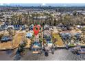 Aerial view of waterfront home with pool, dock, and convenient beach access at 1341 Waterway Dr., North Myrtle Beach, SC 29582