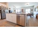 Open concept kitchen featuring stainless steel dishwasher and view of the dining area at 244 Carolina Lakes Blvd., Myrtle Beach, SC 29588
