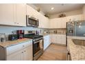 Modern kitchen featuring stainless steel appliances and granite countertops at 244 Carolina Lakes Blvd., Myrtle Beach, SC 29588