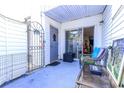 Relaxing patio space with comfortable seating, privacy gate, and room for outdoor decor at 401 Cambridge Circle # A1, Murrells Inlet, SC 29576
