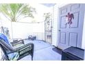 This cozy patio features comfortable seating and a privacy gate, creating a peaceful outdoor retreat at 401 Cambridge Circle # A1, Murrells Inlet, SC 29576
