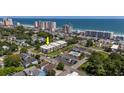 Aerial view of condo complex with beach and other high rises in the background at 405 21St Ave. S # 1-O, North Myrtle Beach, SC 29582