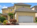 Two-story home featuring a front-entry, two-car garage and mature landscaping at 4306 Windy Heights Dr., North Myrtle Beach, SC 29582