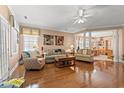 Spacious living room featuring hardwood floors, neutral tones, and lots of natural light at 4306 Windy Heights Dr., North Myrtle Beach, SC 29582
