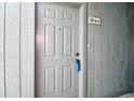 Close-up of a well-maintained front door with modern hardware and classic panel design at 4717 Cobblestone Ln. # B3, Myrtle Beach, SC 29577