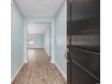 Inviting entryway featuring wood-look floors and light blue walls at 1320 Midtown Village Dr., Conway, SC 29526