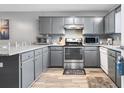 Charming kitchen featuring stainless steel appliances and ample counter space at 3308 S Ocean Blvd. # 2-A, North Myrtle Beach, SC 29582