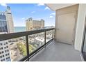Balcony with clear glass railing overlooking an ocean view and city street at 400 20Th Ave. N # 1101, Myrtle Beach, SC 29577
