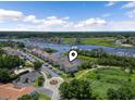 Aerial view of a condo community, waterway, marshland and landscaping on a sunny day at 4405 Eastport Blvd. # D-8, Little River, SC 29566