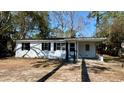 Lovely single-story house with a practical carport for covered parking at 512 W Baptist St., Marion, SC 29571