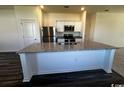 Kitchen island with granite counters and stainless steel appliances at 645 Castillo Dr., Loris, SC 29569