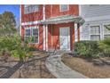 Inviting entrance with landscaped walkway, leading to the front door at 1654 Low Country Pl. # F End, Myrtle Beach, SC 29577