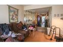 Cozy living room with bright mirror, comfortable seating, and decor at 312 73Rd Ave. N # 15, Myrtle Beach, SC 29572