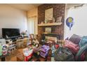 Brick fireplace is the focus of this living room with lots of items at 312 73Rd Ave. N # 15, Myrtle Beach, SC 29572