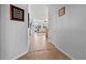 Entryway featuring tile floors, a view to the living area, and neutral paint colors at 4517 Planters Row Way, Myrtle Beach, SC 29579