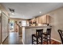 Functional kitchen featuring bar-style seating, ample counter space, and modern appliances at 592 Riverward Dr. # 592, Myrtle Beach, SC 29588