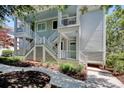 Two-story condo with covered decks and mature landscaping at 63 Mckissick Dr. # 2B, Pawleys Island, SC 29585