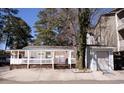 Charming beach house with covered porch and a detached garage providing extra storage at 1733 Neptune Rd., Myrtle Beach, SC 29575